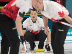 Canada's Ben Hebert keeps an eye on his stone during round-robin action against Norway at the PyeongChang 2018 Olympic Winter Games in Korea, Thursday, February 15, 2018.Ben Hebert, the lead on Kevin Koe's Olympic men's curling team, asks his fellow curlers irreverent and sometimes embarassing questions on his web series "The Sheet Show."
