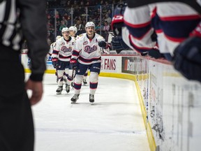 The Regina Pats celebrate after Josh Mahura scores a goal during WHL action against the Prince Albert Raiders at the Brandt Centre on Saturday.