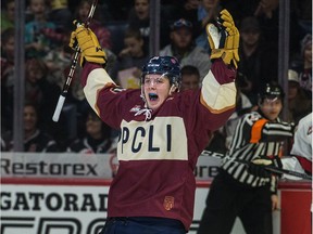 Emil Oksanen of the Regina Pats celebrates his second-period goal en route to a 4-2 win over the Moose Jaw Jaw Warriors at the Brandt Centre on Sunday.