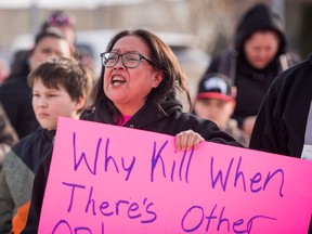 Colten Boushie's mother Debbie Baptiste addresses demonstrators gathered outside of the courthouse in North Battleford, Sask., on Saturday, February 10, 2018.