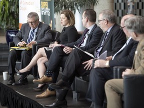 Protein Industries Canada (PIC) will receive federal "supercluster" funding to grow the economy. Ralph Goodale, at left, was one of six panel speakers during a news conference held at The Terrace at Innovation Place in Regina.