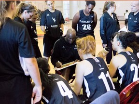 Carleton University Ravens women's basketball head coach Taffe Charles, shown huddling with his players, is looking ahead to the U Sports championship tournament in Regina.