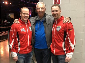 Mark Nichols, left, and Brad Gushue, right, are shown with Ernie Richardson at the 2018 Brier.