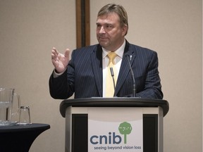 The Saskatchewan Party's Ken Cheveldayoff says a few words after provincial approval for the extensive rebuild of the CNIB building was announced Monday morning. Construction is expected to begin by this summer.