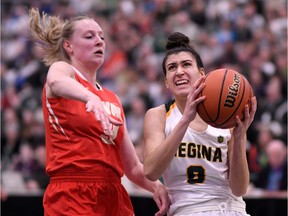 Carolina Goncalves, right, of the University of Regina Cougars is the U Sports women's basketball rookie of the year.