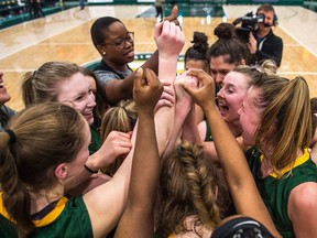 The University of Regina women's basketball team reacts after winning the bronze-medal game against the McGill Martlets on Sunday at the Centre for Kinesiology, Health and Sport.