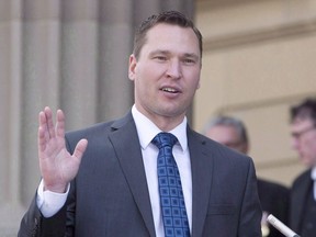 Deron Bilous is sworn in as the Alberta Minister of Municipal Affairs, Service Alberta in Edmonton on May 24, 2015. askatchewan's minister of trade says there is no need to meet with Alberta officials to discuss a short-lived ban on Alberta licence plates on government construction projects. Alberta Economic Development Minister Deron Bilous says the two provinces will continue working to reduce trade barriers and focus on the expansion of the pipeline.