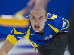 Alberta skip Brendan Bottcher watches a rock at the Tim Hortons Brier.