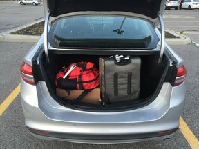 A tradeoff for excellent fuel economy is little trunk space in the Energi; with three items it is full.