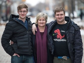 From left, Max Stevens, Kellie Garrett and Connor Stevens on Scarth Street.