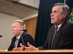 SLGA Minister Gene Makowsky, left, and Justice Minister Don Morgan address the legalization of marijuana at the Saskatchewan Legislative Building in Regina.