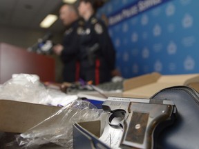 A Smith & Wesson pistol sits on a table during a news conference at the Regina Police Service in February 2017. It was one of 157 guns turned in through the RPS's gun amnesty program.