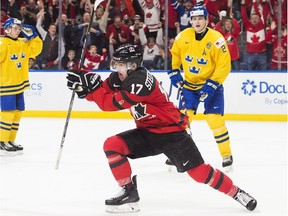 Canadian forward Tyler Steenbergen celebrates his game-winning goal against Sweden in the gold-medal final of the IIHF world junior championship in Buffalo.