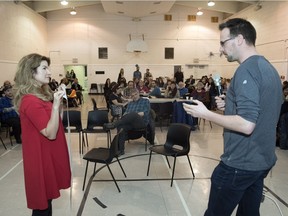 Alina Turner, consultant for Regina's anti-homelessness initiative, left, and councillor Andrew Stevens discuss homelessness issues during a summit on the topic of homeless held at the Regina Treaty Status Indian Services in Regina.
