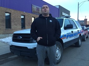 Pat Warnecke in front of Best Buds Society on Cornwall Street on Wednesday, March 28, 2018, shortly after police entered his business.