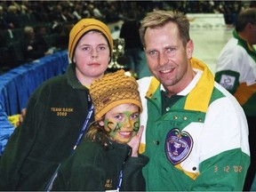 Kelly Moskowy, right, with his children Braeden, left, and Brooklyn at the 2002 Brier in Calgary.