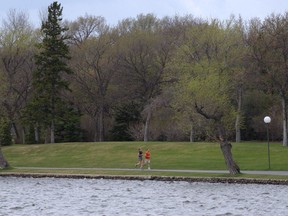 People enjoying the beauty and space of Wascana Park.