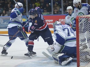 Regina Pats captain Sam Steel tries to find the puck in front of Swift Current Broncos goalie Stuart Skinner in Game 2 of a second-round WHL playoff series on Saturday.