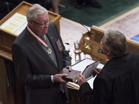 Lawyer and negotiator Thomas Molloy is sworn in as Saskatchewan's 22nd lieutenant-governor in Regina, Saskatchewan on Wednesday March 21, 2018.