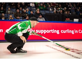 Team Saskatchewan skip Steve Laycock watches a rock sail down the Brandt Centre ice against Ontario at the Brier on Wednesday.