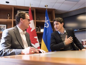 Mayor Michael Fougere speaks with Prime Minister Justin Trudeau at Regina City Hall on Wednesday, March 14, 2018.