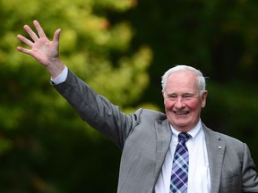 Governor General David Johnston waves as he leaves following a ceremonial tree planting to commemorate the end of his mandate at Rideau Hall in Ottawa on Thursday, Sept. 28, 2017.