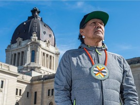 Rod Belanger, a Sixties Scoop survivor and board member of the Sixties Scoop Indigenous Society of Saskatchewan, stands in front of the Saskatchewan Legislative Building in Regina. The SSISS met with the provincial government on April 17 to discuss what steps are needed before an apology can be made.