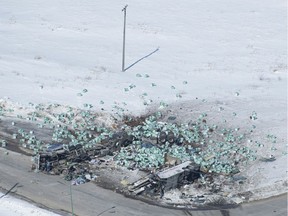 The wreckage of a fatal crash outside of Tisdale, Sask., is seen Saturday, April, 7, 2018. A bus carrying the Humboldt Broncos hockey team crashed into a truck en route to Nipawin for a game on April 6, 2018, killing 15 and sending over a dozen more to the hospital.