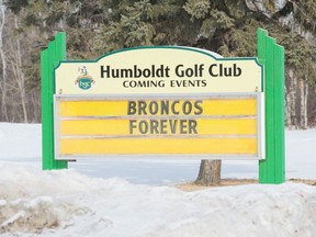 A sign displays the message "Broncos Forever" on 8th Avenue in Humboldt, Saskatchewan in memory of those who died in the collision involving the Humboldt Broncos team bus.