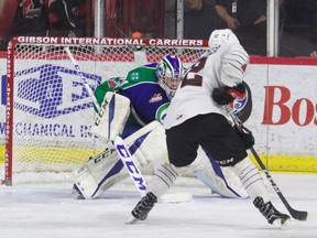 Moose Jaw Warriors sniper Jayden Halbgewachs goes one on one with Swift Current Broncos goalie Stuart Skinner in WHL playoff action Friday night.