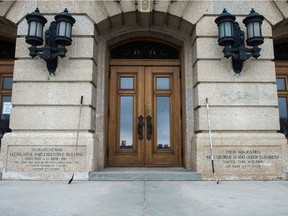The hockey sticks outside of the doors of the Saskatchewan legislative building in Regina after the Humboldt Broncos hockey team bus crash became a mental health awareness moment for the person who them there.
