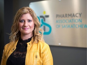 Myla Wollbaum, the Pharmacy Association of Saskatchewan's director of professional practice, stands in the entrance to the association's office on Pasqua Street.