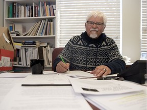 Dave Nelson, associate executive director of the CMHA, Saskatchewan division, reviews the provincial budget on Tuesday.