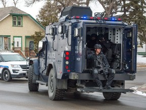 A Regina police SWAT team arrives to a police call on the 400 block of McIntyre Street in Regina.