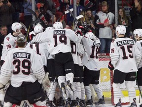 The Moose Jaw Warriors celebrate a first-round WHL playoff series victory over the Prince Albert Raiders on Tuesday at Mosaic Place.