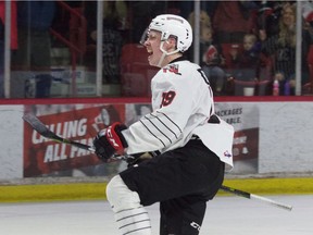 Brayden Burke of the Moose Jaw Warriors celebrates his series-winning goal Tuesday against the Prince Albert Raiders.