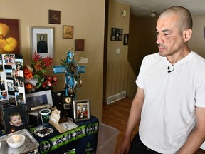 Jared Ahenakew looks over the shrine made in memory of his son Brennan Ahenakew on May 18th, 2018.