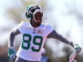 SASKATOON, SK - Saskatchewan Roughriders Receiver Duron Carter takes a water break during day one of Rider training camp at Griffiths Stadium in Saskatoon, Sask. on May 20, 2018.