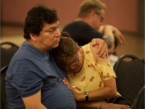 Leo and Josephine Ledoux embrace during the government announcement on May 24, 2018 of a decrease in drug and alcohol-related traffic fatalities in Saskatchewan in 2017. The Ledouxs' daughter Brandi Lepine was killed by a drunk driver in 2013. Granddaughter Aurora Ledoux, 4, who was saved the night of the accident through emergency C-section, was taken off life support earlier this year.