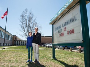 Marlene Jackson, right, chair of the Argyle School community council, and her daughter Elise Jackson-Reynolds stand in front of Argyle School.