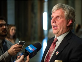 Shawn Davidson, president of the Saskatchewan School Boards Association, speaks with reporters at the legislative building in Regina following the release of the 2018-2019 provincial budget.
