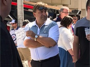 Ken Cheveldayoff, a Saskatchewan member of the legislature, was spotted hawking tickets outside Bell MTS Place before Game 5 of the NHL's 2018 Western Conference final between the Winnipeg Jets and Las Vegas Golden Knights. He says he purchased them for a friend who was unable to make it. (Photo courtesy Twitter.com/TheForumInMTL)