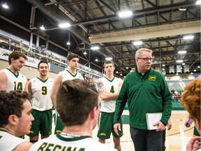 University of Regina Cougars men's volleyball coach Greg Barthel talks to his players during a January match. Men's volleyball is among three programs that have been eliminated by the U of R.