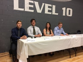 University of Regina Cougars athletes, left to right, Paul Tokarz, Jordan Tholl, Amber Wiebe and Michael Corrigan appear at a Monday media conference to discuss cuts to the school's athletic program.