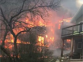 A screenshot of video taken by Dallas Huber shows fire claiming a cottage on Lakeshore Drive in the Kannata Valley.