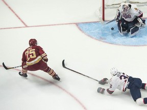 Regina Pats goalie Max Paddock, right, was brilliant in Sunday's Memorial Cup final.