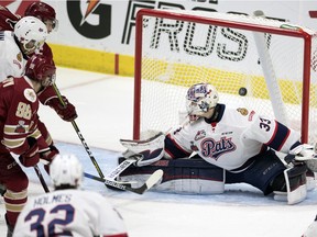 The Acadie-Bathurst Titans routinely pumped pucks past Pats goaltender Max Paddock during Sunday's Memorial Cup game at the Brandt Centre.