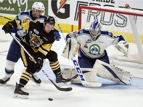 Stuart Skinner, right, sparkled in goal for the Swift Current Broncos on Monday against the Hamilton Bulldogs.