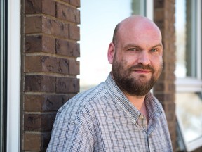 Comedian Ian Morrison stand in front of the Canadian Mental Health Association, Saskatchewan division office on 12th Avenue.