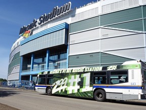 A City of Regina transit bus on Elphinstone Street passing by the new Mosaic Stadium.